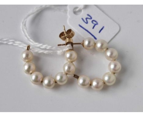 A pair of 9ct pearl hoop earrings