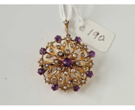 A CIRCULAR PENDANT WITH PEARLS AND AMETHYSTS 15CT GOLD 7.7 GMS