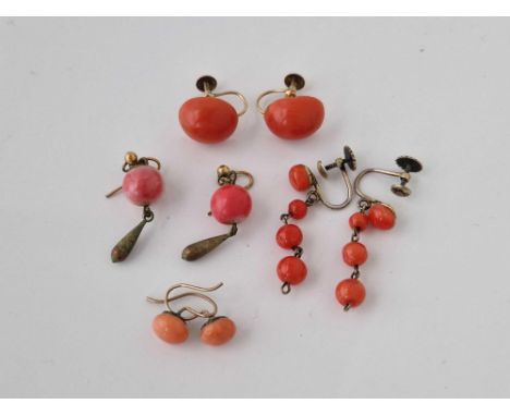 Four pairs of gold mounted coral earrings