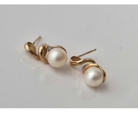 A pair of pearl set earrings 9ct 2.2 gms