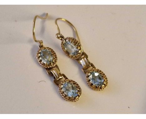 A delightful pair 0f aquamarine double drop 9ct earrings 2.3g