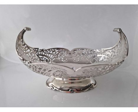 A good large pierced fruit dish, boat shaped, 11" long, Sheffield 1942 by HW, 650g