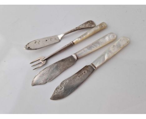 Pair of butter knives with M O P handles. Sheffield 1896, a pickle fork and a butter knife