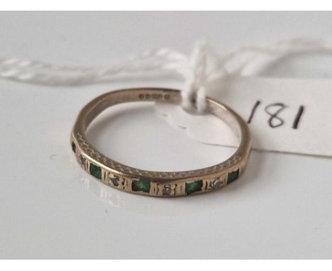 A white gold emerald and diamond half hoop ring 18ct gold size O 2.2 gms