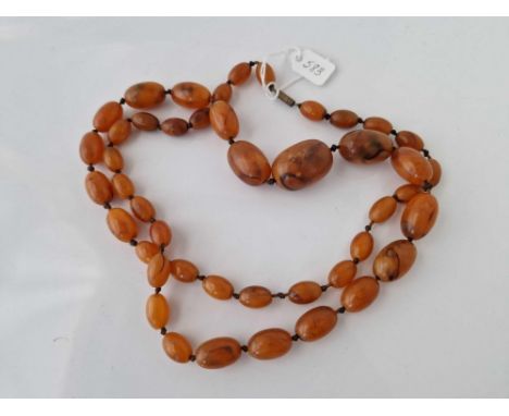 A old string of amber type beads 34 inch