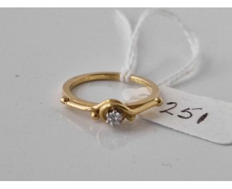 A modernistic diamond solitaire ring 18ct gold size L 2.5 gms