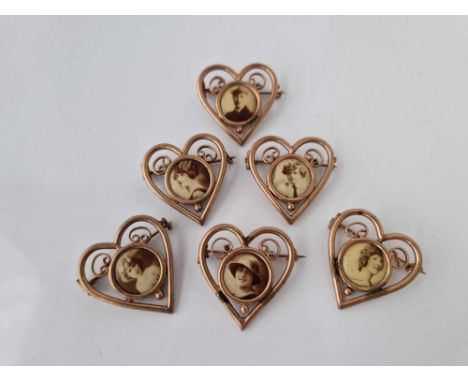 A unusual set of six gilt heart shaped vintage portrait brooches