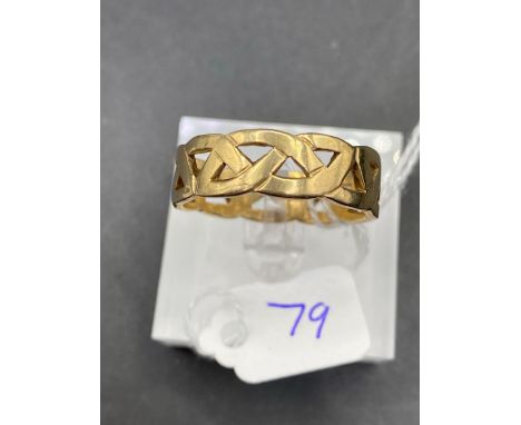 A large Celtic style pierced ring 9ct size Z+4 7g