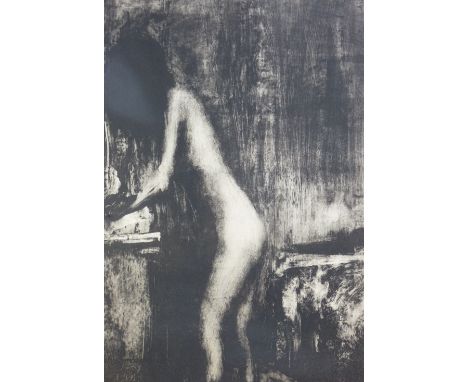 HARRY HOLLAND black and white limited edition (17/33) print - nude lady at a work table, signed, 52 x 40.5 cms