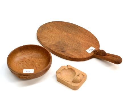 A Robert ''Mouseman'' Thompson Oak Cheese Board, with carved mouse signature on the handle, 40cm; A Robert ''Mouseman'' Thomp