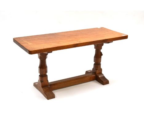 A Robert ''Mouseman'' Thompson Oak 3' Rectangular Coffee Table, on two octagonal legs, joined by a stretcher at floor level, 