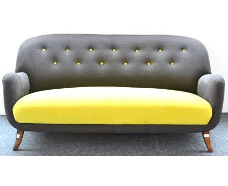 A 1950's Three Piece Button Back Suite, upholstered in contrasting blue/grey and yellow weave, on four swept oak feet, compri