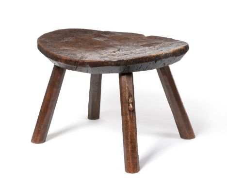 A 1930's Robert ''Mouseman'' Thompson Burr Oak Dished Stool, with oval shaped saddle top, heavy burr figuring, on four octago