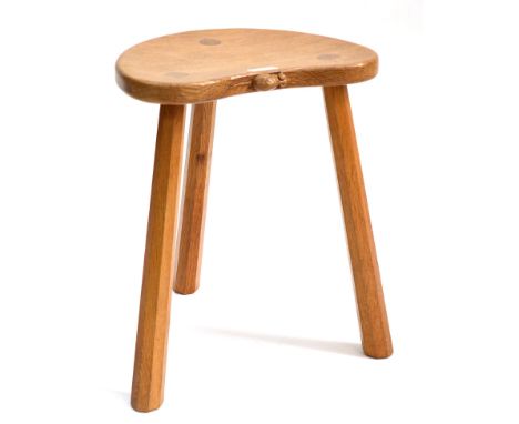 A Robert ''Mouseman'' Thompson Oak Kidney Cow Stool, on three tapered octagonal legs, with carved mouse signature to the seat