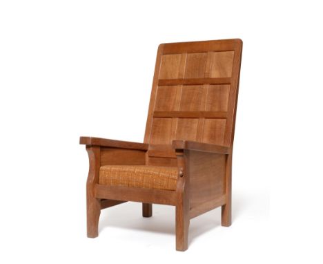 A Robert ''Mouseman'' Thompson Oak Smoker's Chair, with panelled back, shaped arm rests, with carved mouse signature, 106.5cm