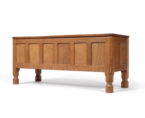 A Robert ''Mouseman'' Thompson Panelled Oak Blanket Box, on four octagonal and block feet, with carved mouse signature, 104cm