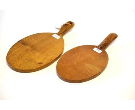 A Robert ''Mouseman'' Thompson Oak Cheese Board, with carved mouse signature on the handle, 37cm; and A David ''Leafman'' Dut