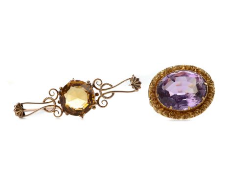 AMETHYST BROOCH, set with an oval amethyst 17.2mm long, within an engraved border, unmarked, along with a citrine bar brooch 