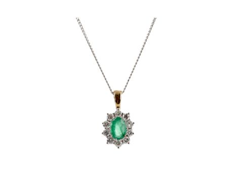 EMERALD AND DIAMOND PENDANT, set with an oval emerald of approximately 1.00 carat, within a halo of round brilliant cut diamo