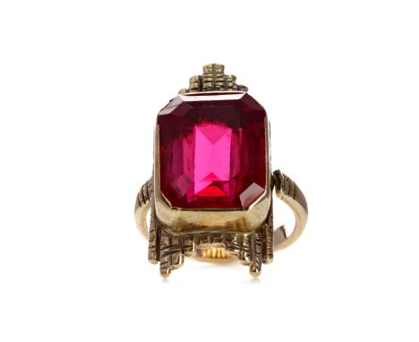 ART DECO STYLE RED GEM SET RING, set with an octagonal step cut red gem, to an Art Deco style mount, marks worn, size K, 9.8g