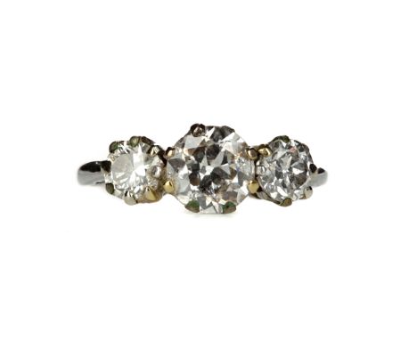 DIAMOND THREE STONE RING, the central Old European cut diamond of approximately 0.85 carats flanked by a smaller Old European