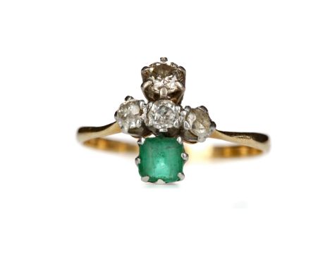 EMERALD AND DIAMOND RING, set with a cushion shaped emerald beneath three old cut diamonds, in turn beneath a round brilliant