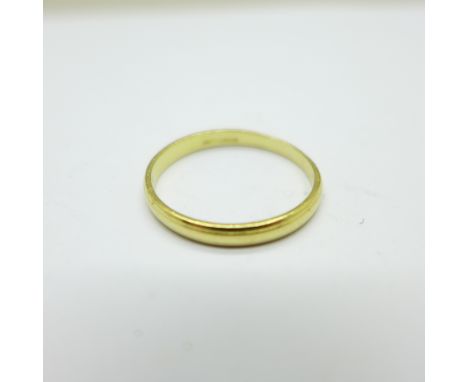 An 18ct gold ring, 2.7g, T, bears inscription 