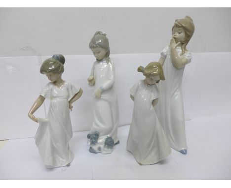 Two Nao Childhood Collection figures, Girl Yawning model no. 02000230, 29cm, and Girl in Nightdress, model no. 02010595, 26cm