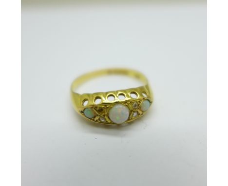 An 18ct gold, opal and diamond ring, lacking one diamond, 2.1g, P, Chester hallmark 