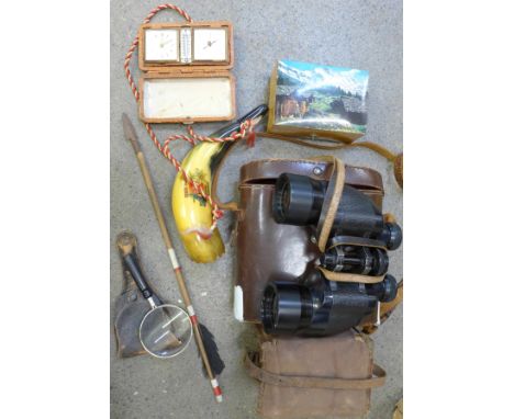 A pair of binoculars, Ross 7x42, a box camera, arrow, magnifying glass, etc. 