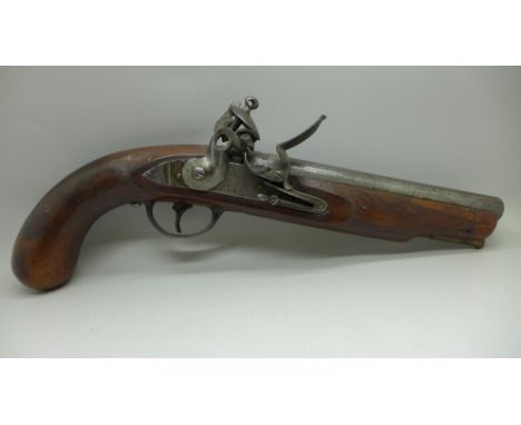 An English military issue 19th Century flintlock pistol, marked Tower and with broad arrow 