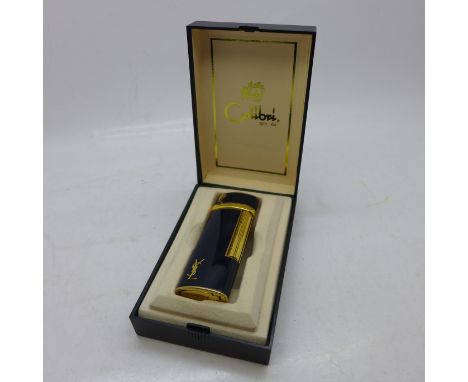 A Yves Saint Laurent lighter, losses to enamel 