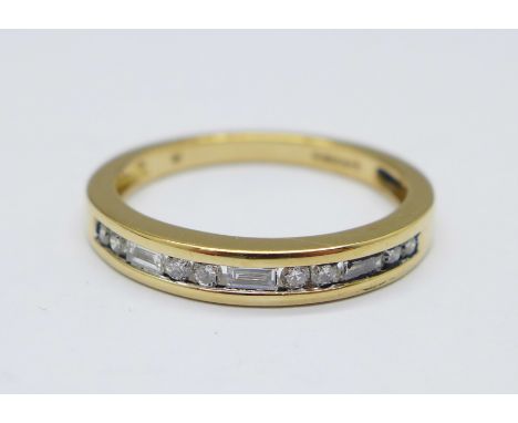 An 18ct gold, eleven stone diamond ring, 3.2g, N 