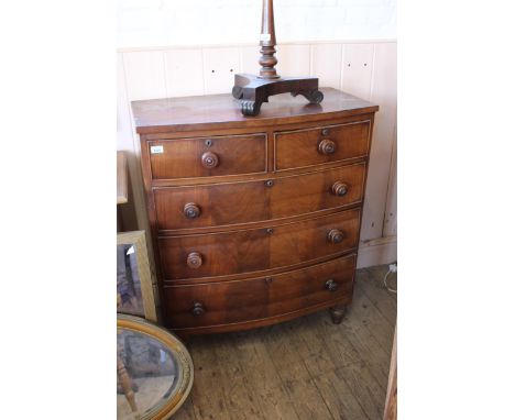 A Victorian mahogany five drawer bow chest (top as found)