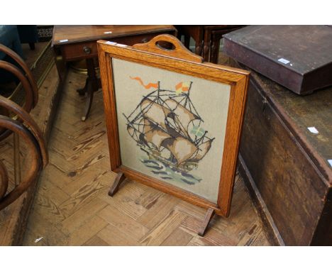 An oak framed tapestry of a ship
