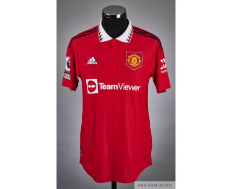 Lisandro Martinez red No.6 Manchester United short-sleeved shirt, 2022-23, Adidas, 6 with button-up collar and printed badge,