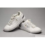 Roger Federer a pair of white tennis shoes autographed by Roger Federer at the 2022 Laver Cup