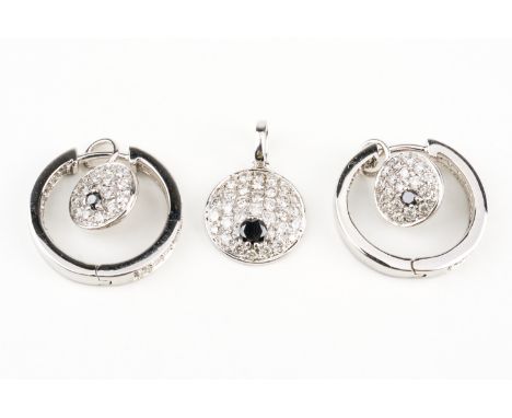 A PAIR OF 9CT WHITE GOLD, DIAMOND AND BLACK DIAMOND PENDANT EARRINGS AND A MATCHING PENDANT (3)Each earring designed as a hin