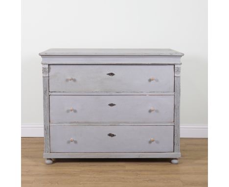 A 19TH CENTURY CONTINENTAL BLUE PAINTED PINE THREE DRAWER COMMODEOn bun feet, 130cm wide; 57cm deep; 105cm high