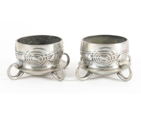 ARCHIBALD KNOX (1864-1933) DESIGN FOR LIBERTY & CO.: A PAIR OF TUDRIC PEWTER CACHE POT OR BOWLS (2)Numbered 0288, raised on r