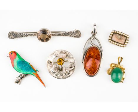 FOUR BROOCHES AND TWO PENDANTS (10)Comprising; an enamelled Sterling silver brooch, designed as a bird, a silver and smoky qu