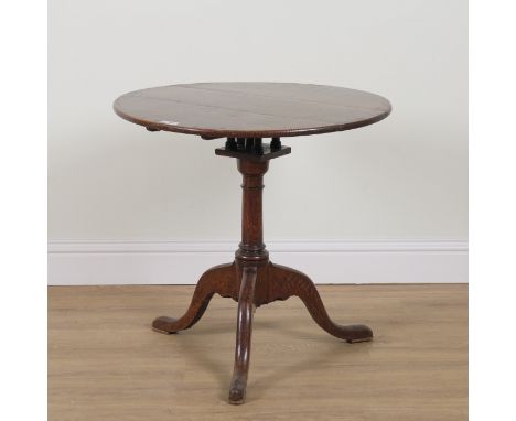 A MID 18TH CENTURY OAK CIRCULAR SNAP-TOP TRIPOD OCCASIONAL TABLEOn birdcage mount, 76cm diameter; 74cm high