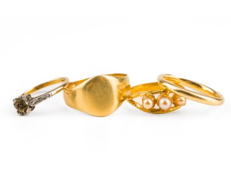 FOUR GOLD RINGS (4)Including an unmarked signet ring testing as 18ct, size T, weight, a 2.4mm wedding band engraved "M.P á D.