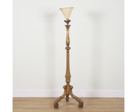 A MID 18TH CENTURY STYLE GILT STANDARD LAMPOn three shell capped scroll supports, 146cm high (excluding fitting)Provenance: T