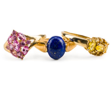 A 9CT GOLD AND LAPIS LAZULI RING AND TWO FURTHER RINGS (3)The lapis lazuli ring size P, a 9ct gold and pink gemstone set clus