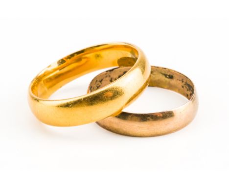 TWO PLAIN GOLD WEDDING BANDS (2)Comprising; a 22ct gold band, London 1918, ring size O, weight 6.3 grams and a 9ct gold band,