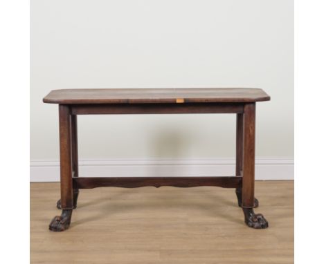 A RECTANGULAR MAHOGANY CONSOLE TABLEOn four turned supports and paw feet, with 19th century elements, 124cm wide; 45cm deep; 