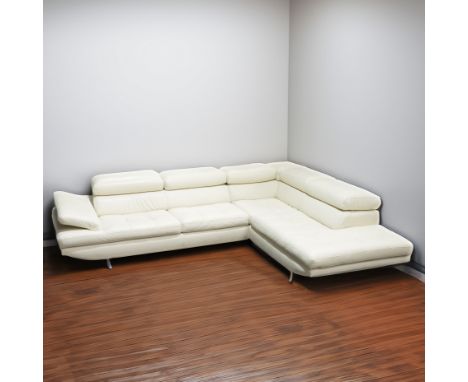 MAXDIVANI ITALY; A CREAM LEATHER UPHOLSTERED CORNER SOFAWith angle adjustable back, on chrome supports 295cm; 340cm; 66cm hig