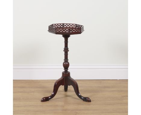 AN 18TH CENTURY STYLE MAHOGANY KETTLE STAND19th century, with galleried octagonal top and tripod base, 32cm wide; 65cm high
