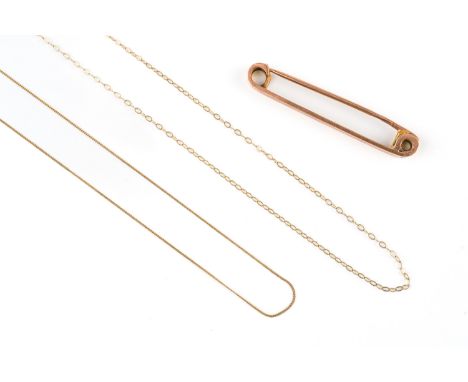 A GOLD BAR BROOCH AND TWO GOLD NECKCHAINS (3)The gold plain bar brooch, Birmingham 1919, the two gold neckchains with boltrin
